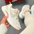 Tênis Nike Running EST 1972 Bege/Ouro
