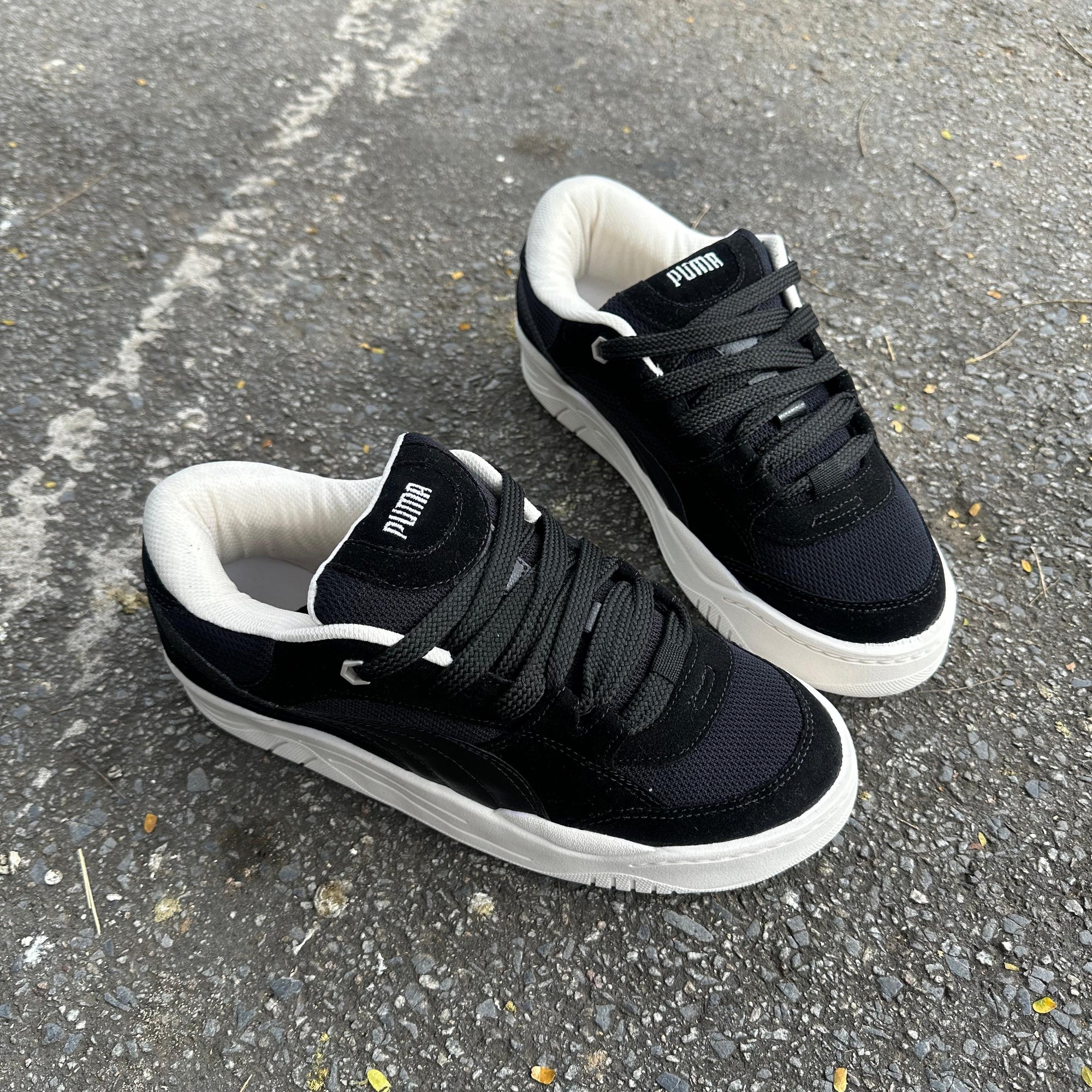 Tênis Puma 180 – Preto/Preto/Off